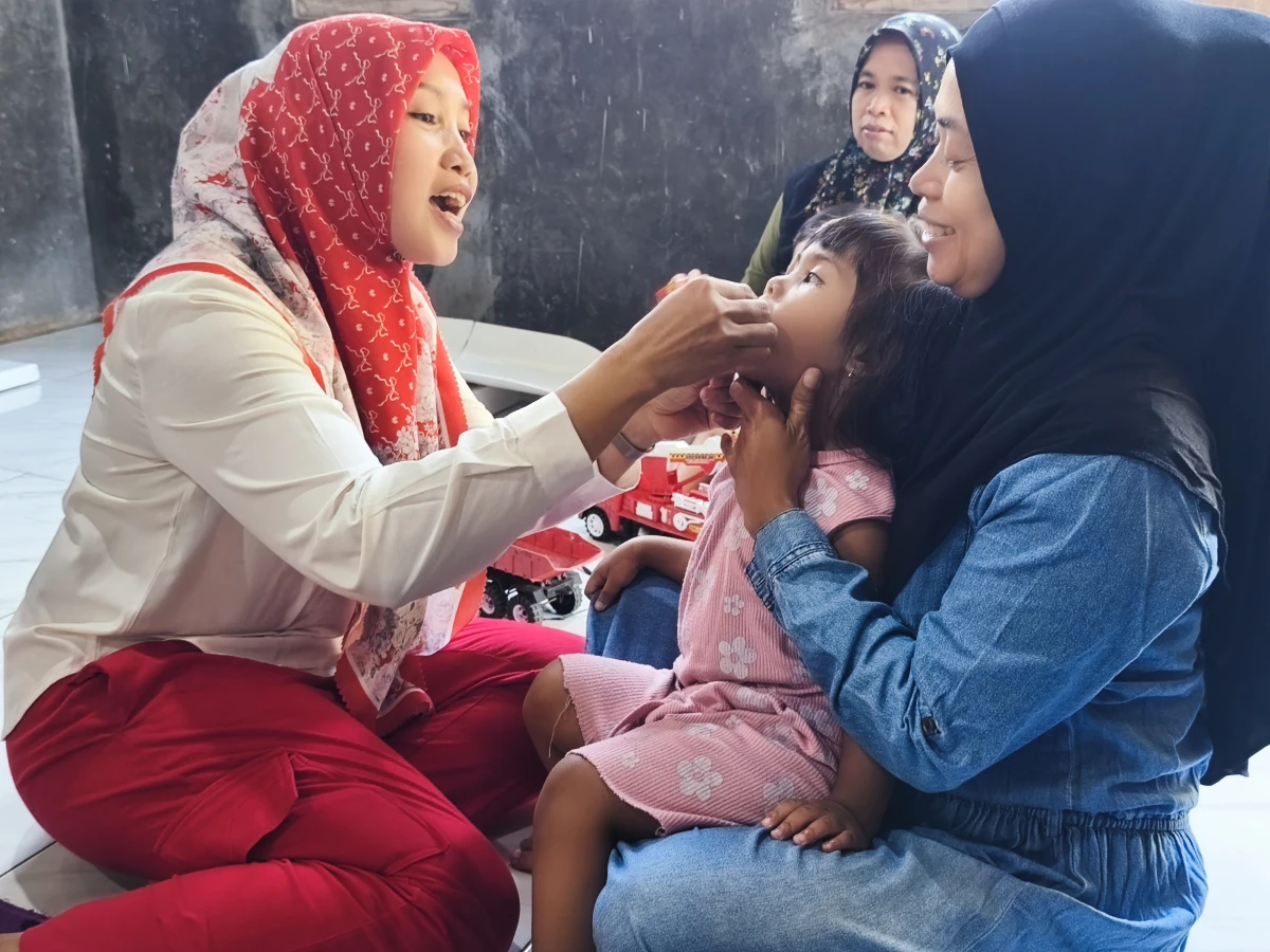 PEMBERIAN VITAMIN A DAN PENYALURAN MBG 3B DI POSYANDU BALITA NUSA JAYA 1 