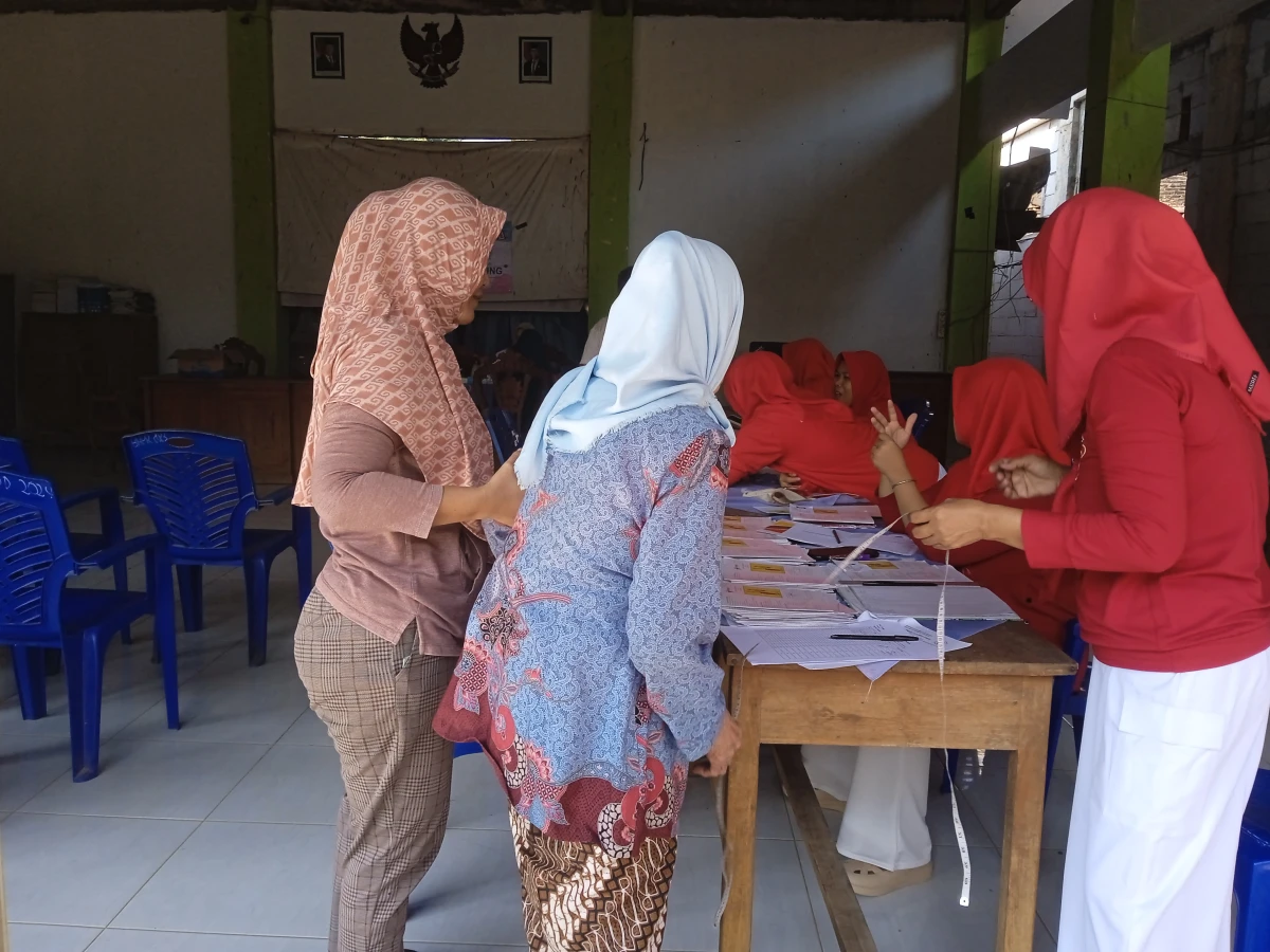 Tp pkk Desa Rau menghadiri dan melaksanakan pelayanan kesehatan di posyandu ILP Desa Rau