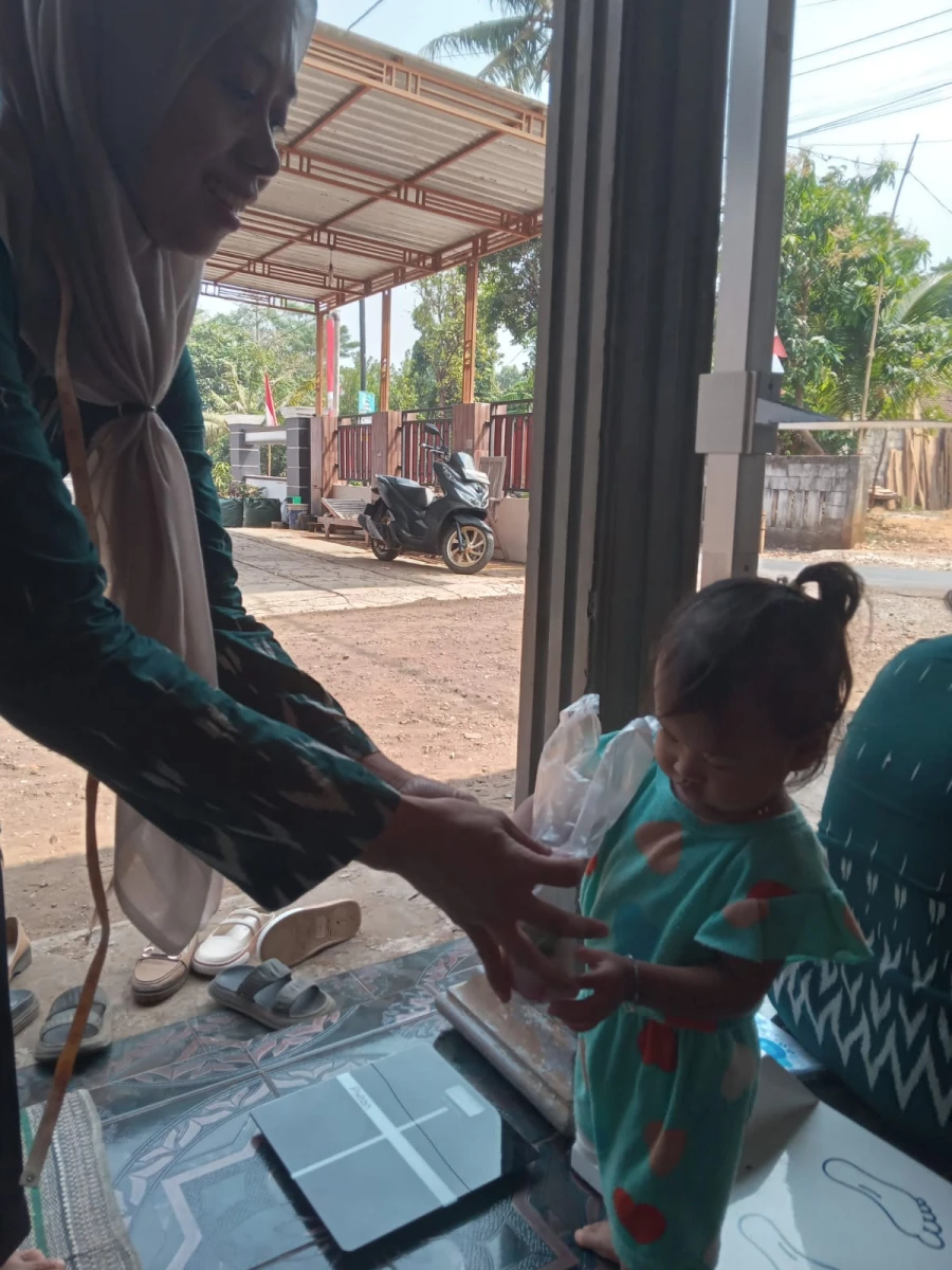 Kegiatan Posyandu Harapan 12 RW 05 Desa Karanggondang dalam Upaya Meningkatkan Kesehatan Masyarakat
