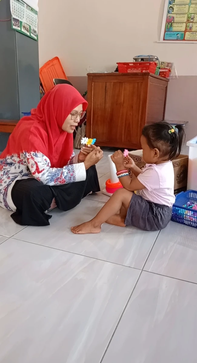 Bunda literasi mengenalkan angka dengan tulisan dan jari