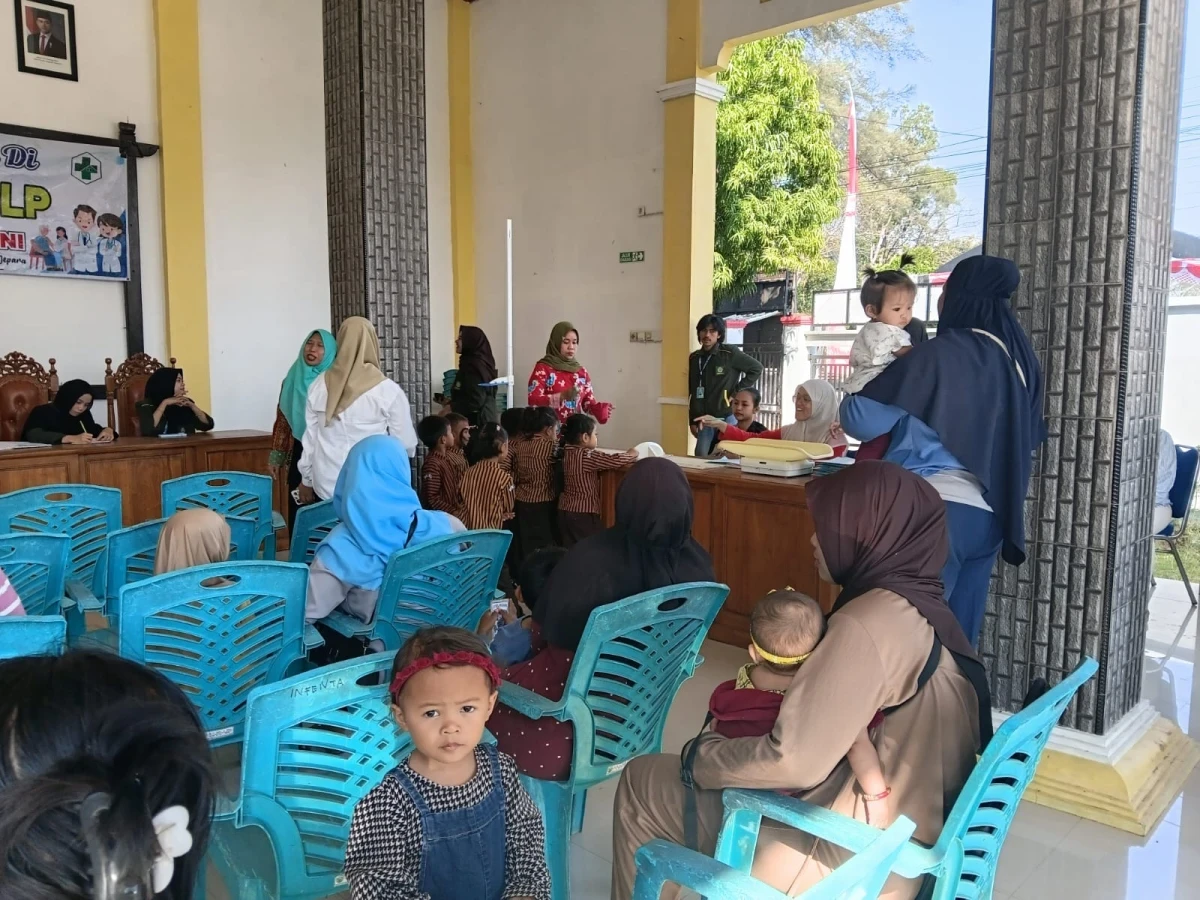 Posyandu 6 SPM Bidang Kesehatan: Penguatan Pelayanan Kesehatan Masyarakat Desa Telukawur