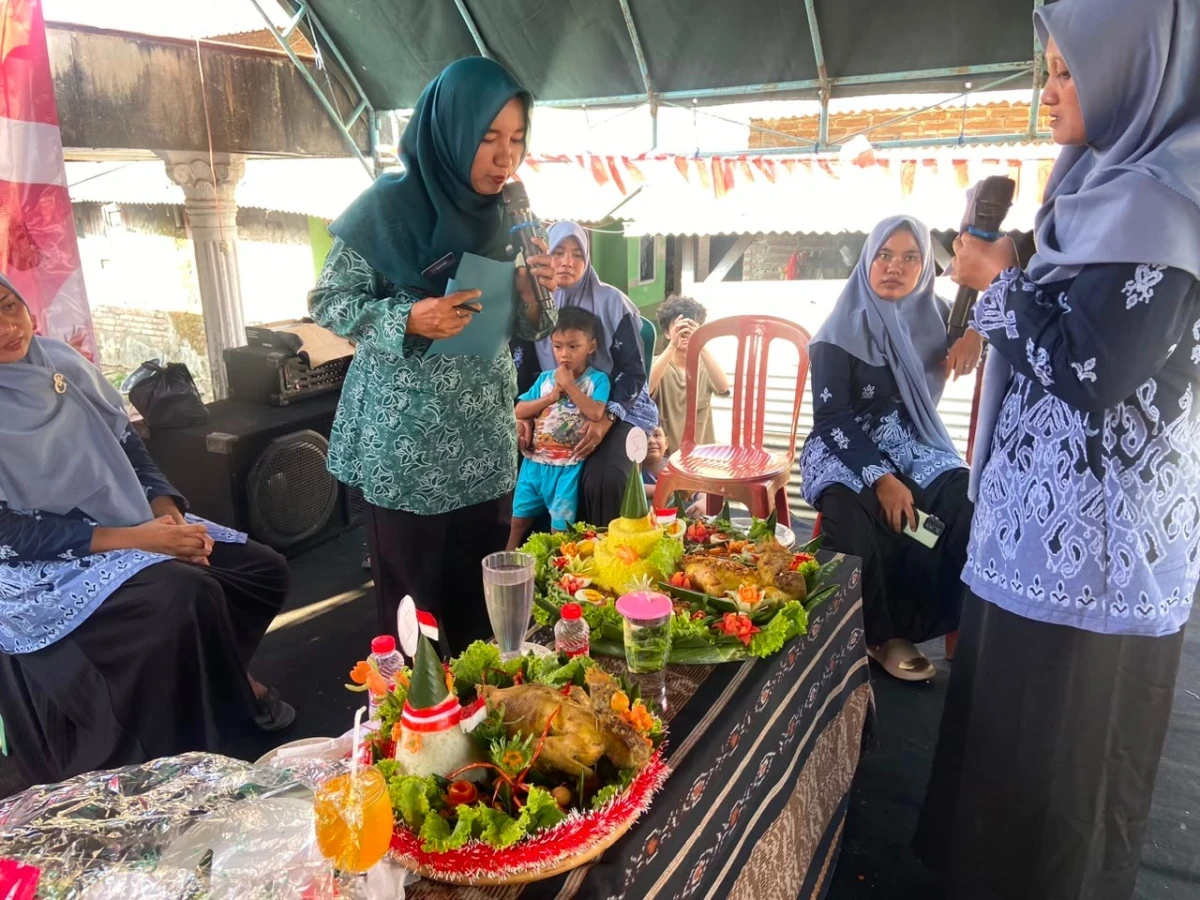 Merias Tumpeng RT 01 RW 02 dalam HUT Kemerdekaan RI Ke-81 Tahun 2026.