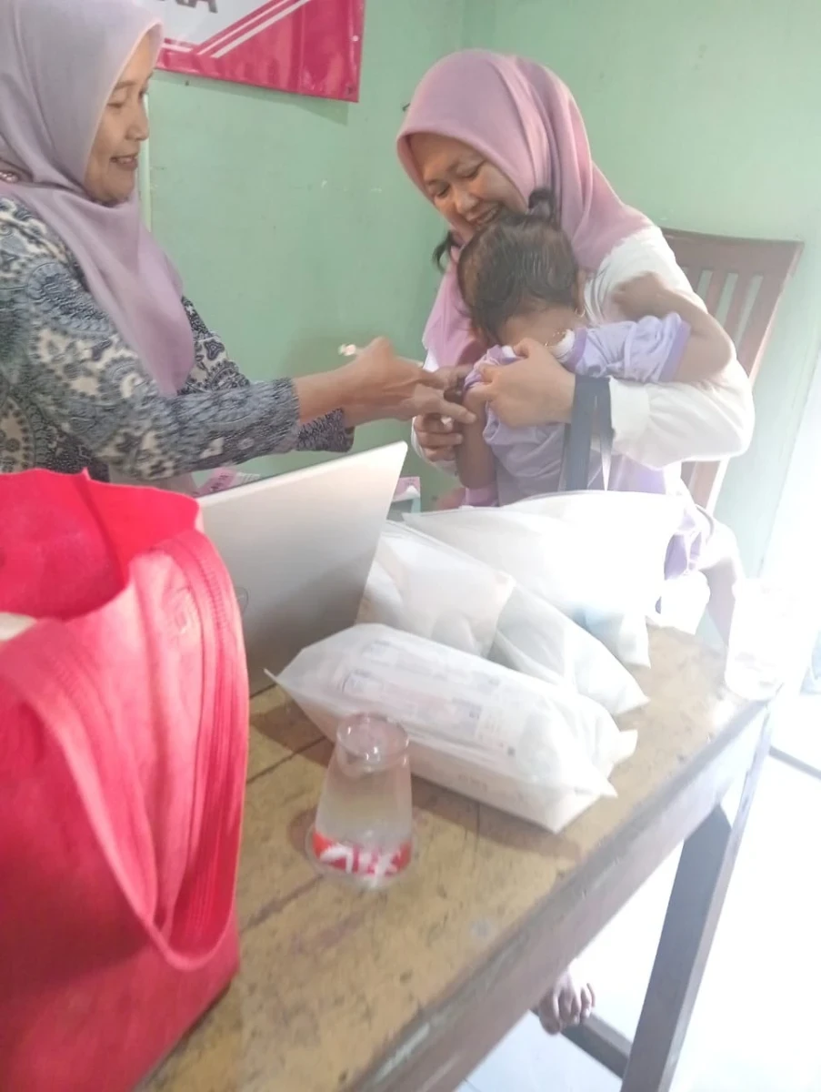 Optimalisasi Tumbuh Kembang Anak Melalui Kegiatan Posyandu Wijaya Kusuma 4 Lebuawu