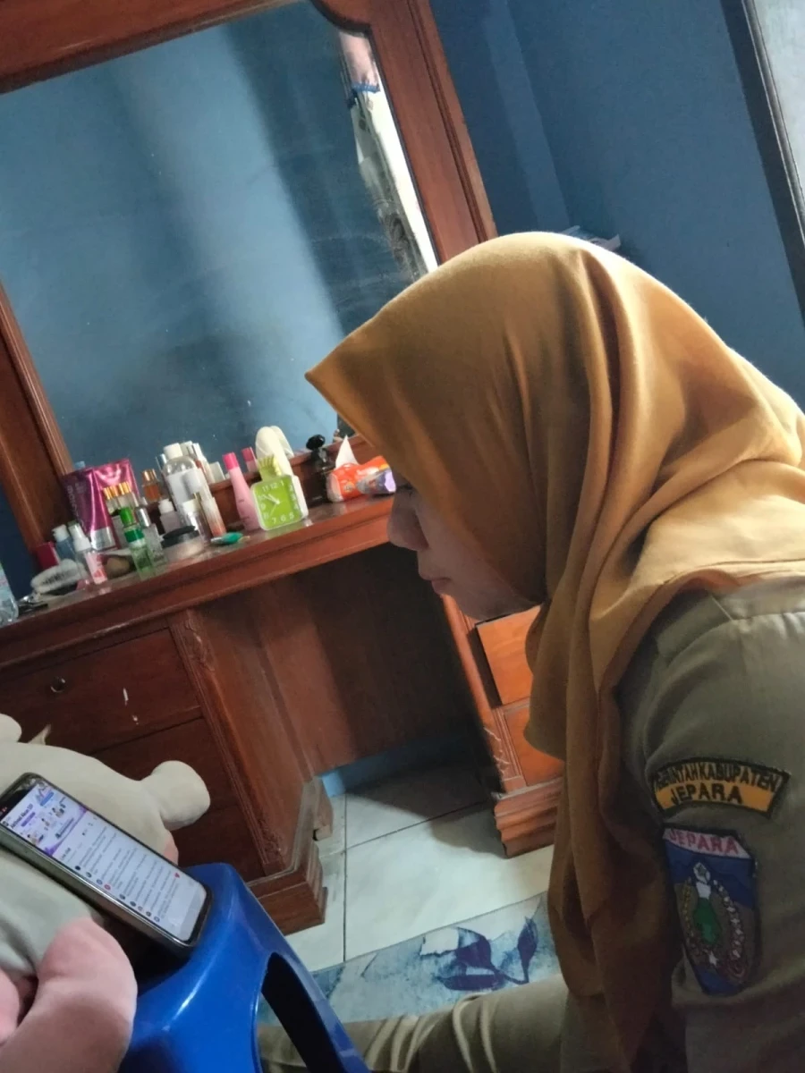 Mengikuti zoom tata cara pemberian nomor register posyandu 