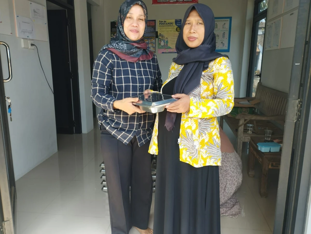 Kader Kesehatan dan Posyandu Telukawur Salurkan Makanan Bergizi Gratis bagi Ibu Hamil