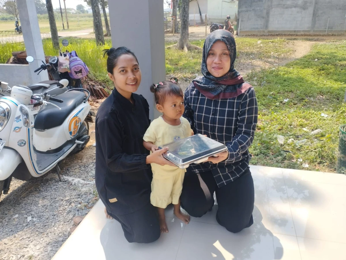 Kader Kesehatan dan Posyandu Telukawur Salurkan Makanan Bergizi Gratis untuk Balita