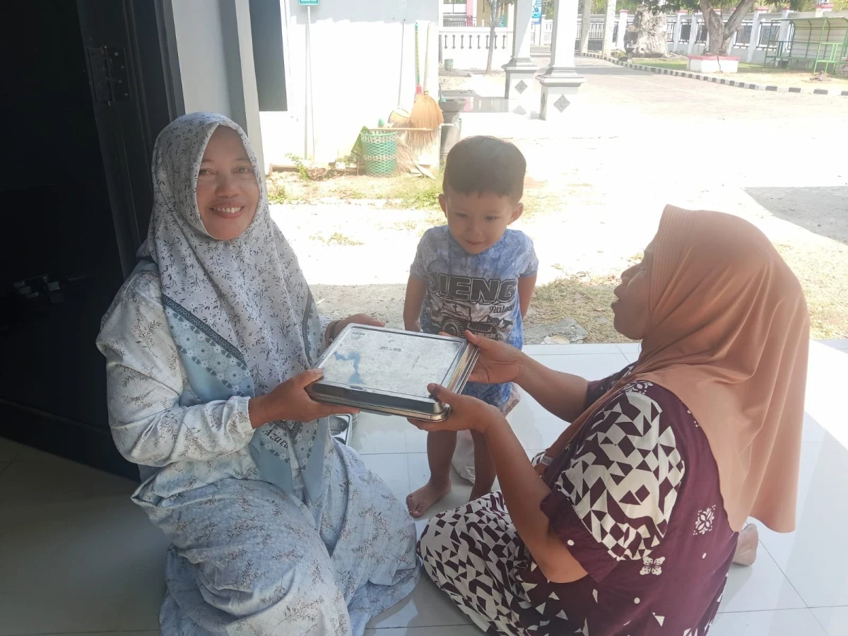 Kader Kesehatan dan Posyandu Telukawur Salurkan Makanan Bergizi Gratis untuk Balita