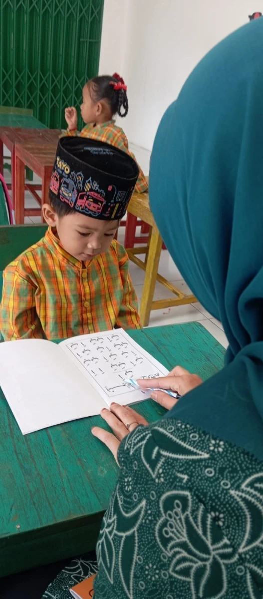 POS PAUD MUTIARA ILMU MENGAJI