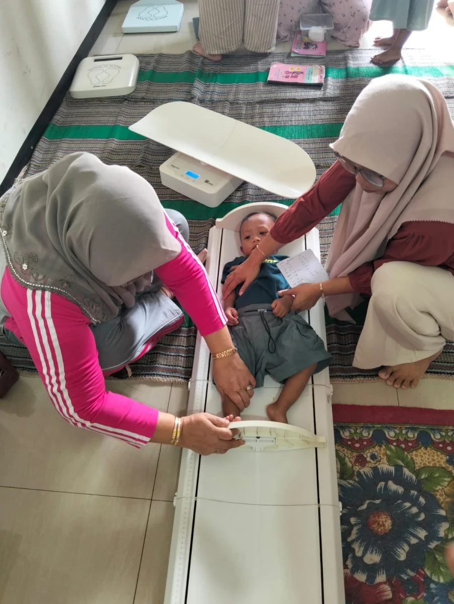 KEGIATAN POSYANDU BALITA POS MAWAR MERAH 1 DESA BANYUMANIS