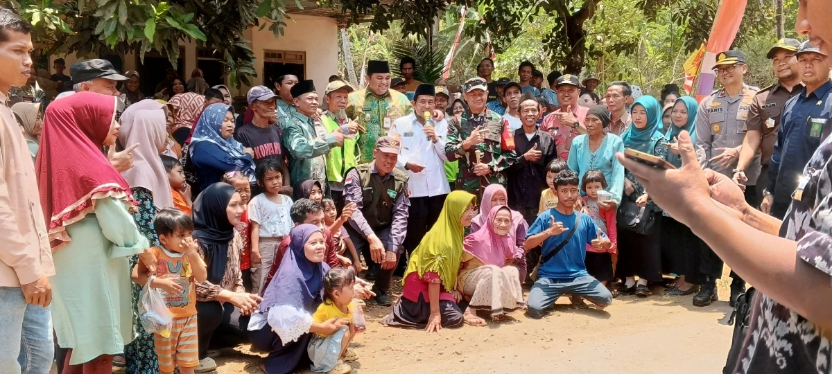 KETUA TP PKK KECAMATAN PAKIS AJI Pendampingan Pembukaan TMMD Sengkuyung Tahap V Tingkat Kabupaten di Lapangan Desa Bulungan