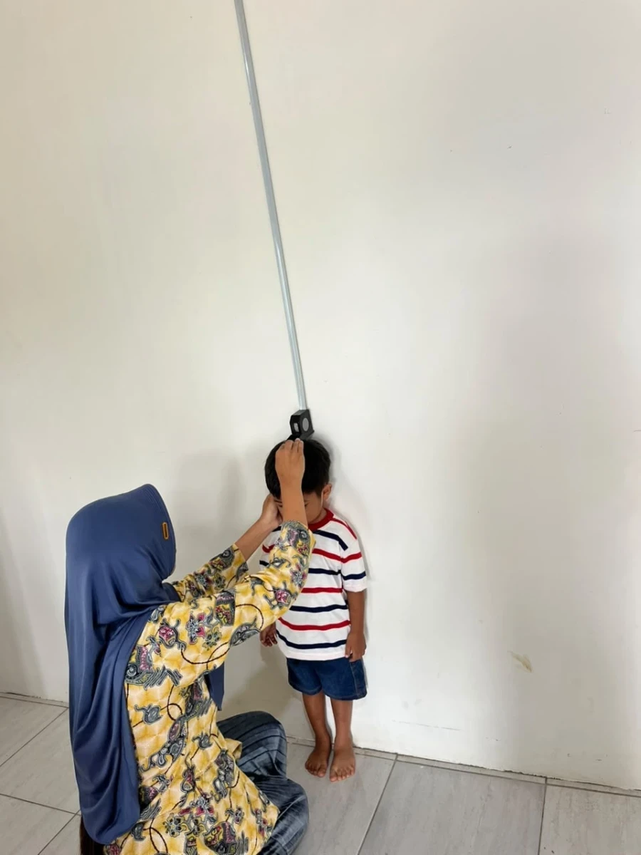 Pengukuran tinggi badan 