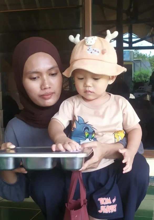Pemberian Makan Bergizi Gratis (MBG) bagi Ibu Menyusui di Posyandu Harapan 6 RW 07 Desa Karanggondang