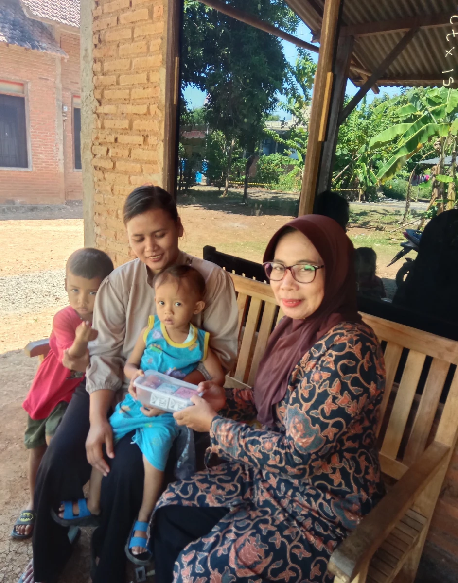 Pemberian PMT Program Genting Minggu ke 1