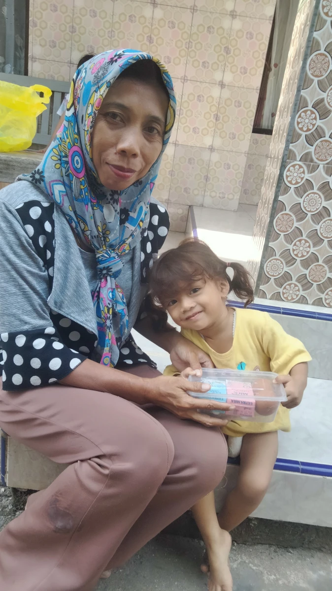 Pemberian PMT Program Genting Minggu ke 4