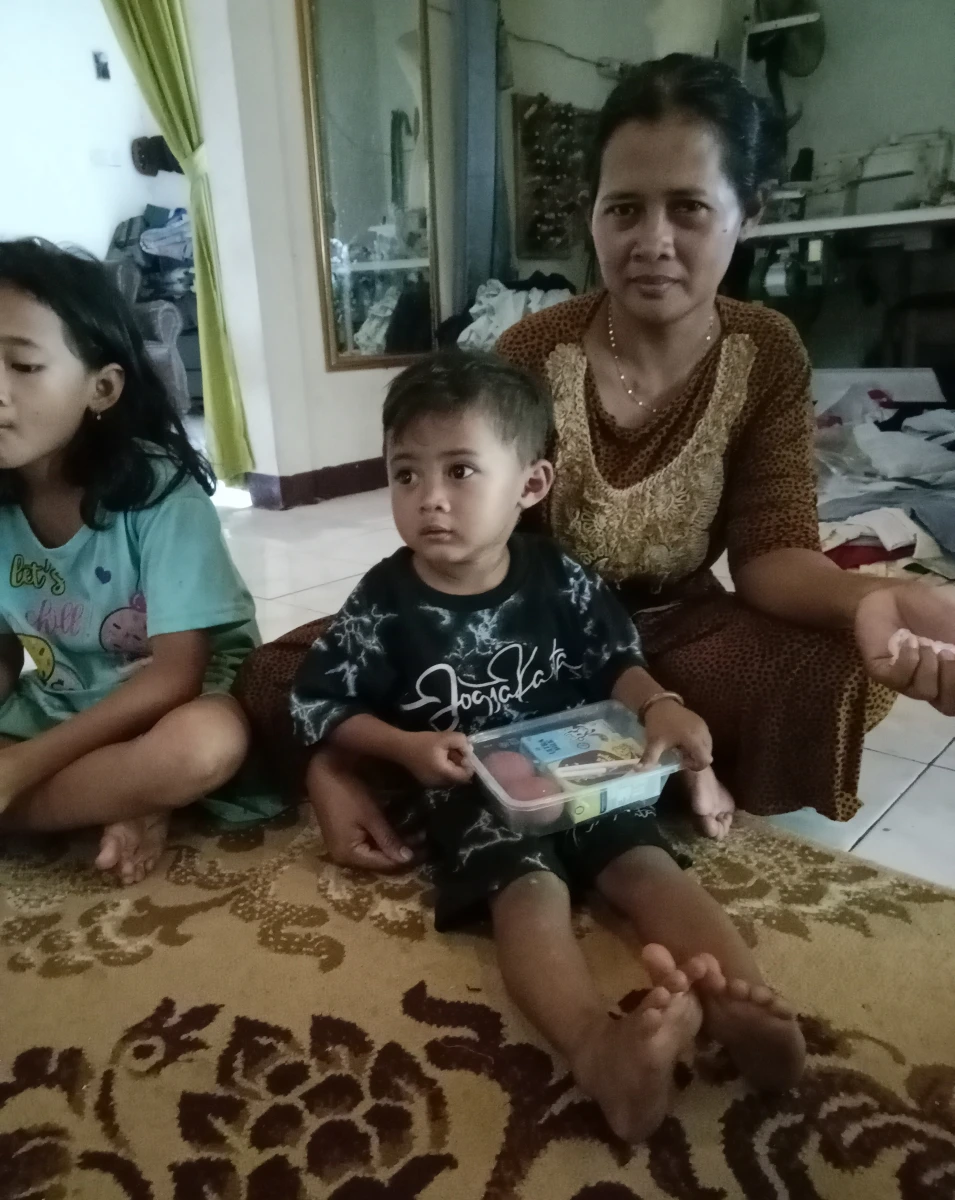 Pemberian PMT Program Genting Minggu ke 9