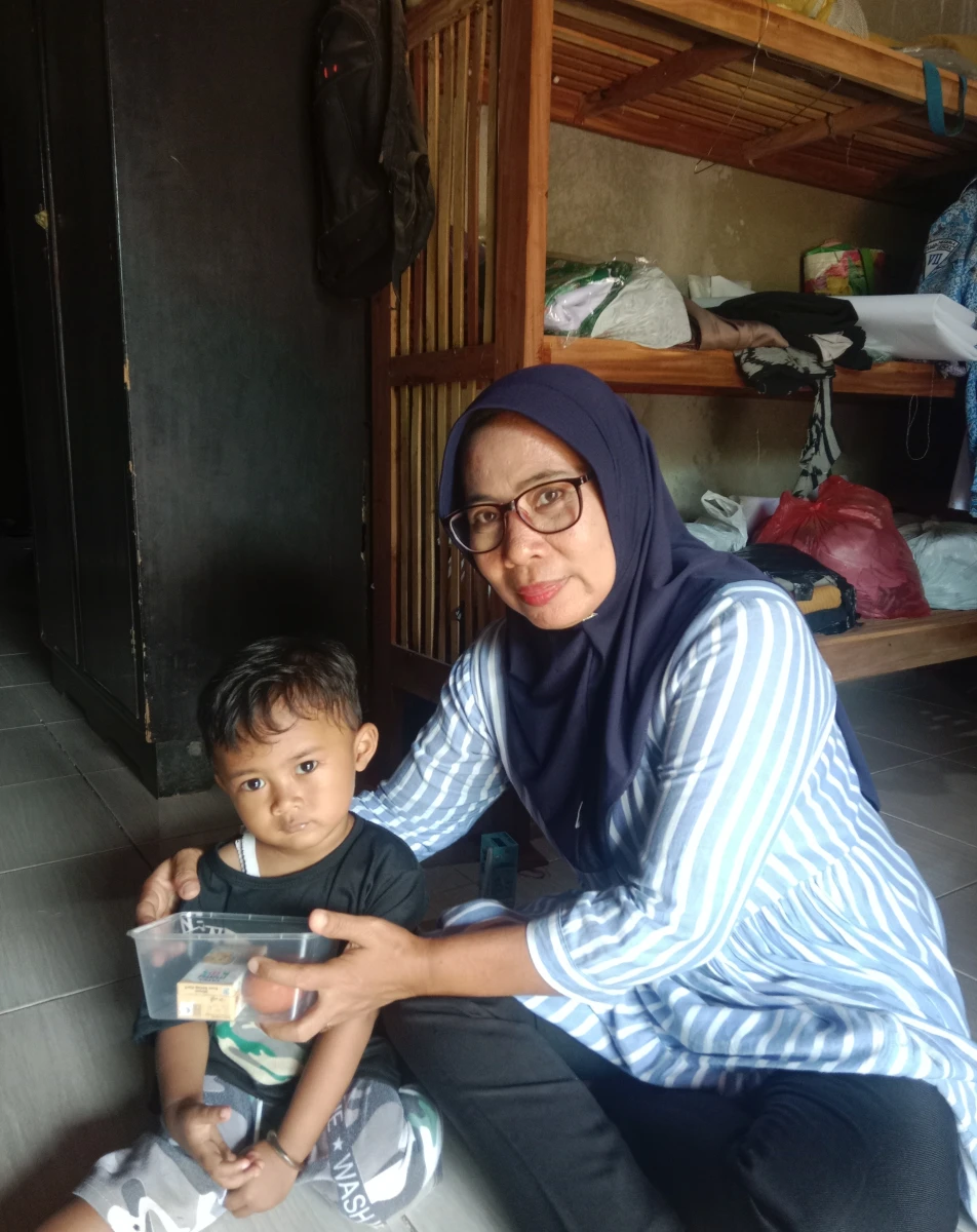 Pemberian PMT Program Genting Minggu ke 12