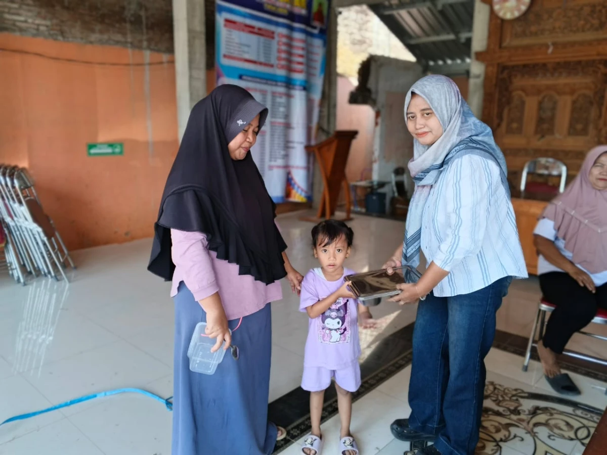 Peran serta kader kesehatan dan kader PKK Pokja4 dalam pembagian MBG 