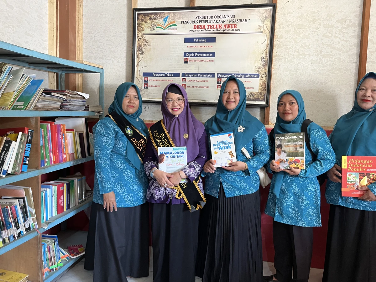 Kunjungan dan Pembinaan ke Perpustakaan Desa Telukawur